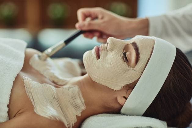 Woman, spa and relax with face mask or applicator, pamper weekend and skincare wellness with client. Facialist, treatment and skin rejuvenation or pore tightening, eyes closed and beauty facial Woman, spa and relax with face mask or applicator, pamper weekend and skincare wellness with client. Facialist, treatment and skin rejuvenation or pore tightening, eyes closed and beauty facial., model released, , 60864378.jpg RECORD DATE NOT STATED
