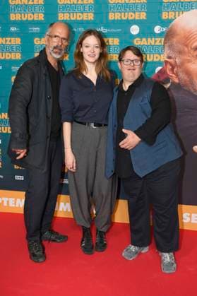 Christoph Maria Herbst, Anna von Stebut und Nico Randel bei der Premiere des Kinofilms Ganzer halber Bruder im Astor Grand Cinema. Hannover, 16.09.2025