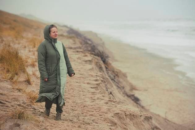 A woman walks by a stormy sea in Denmark A woman walks by a stormy sea in Denmark., model released, , 97777110.jpg RECORD DATE NOT STATED