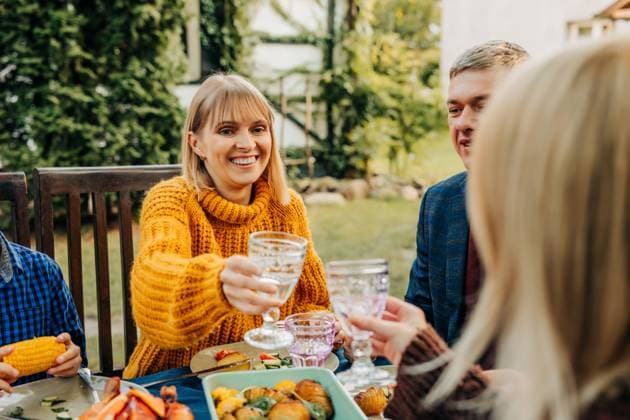 Family celebrating thanksgiving together outdoors at dinner table model released, Symbolfoto property released, VSNF04160