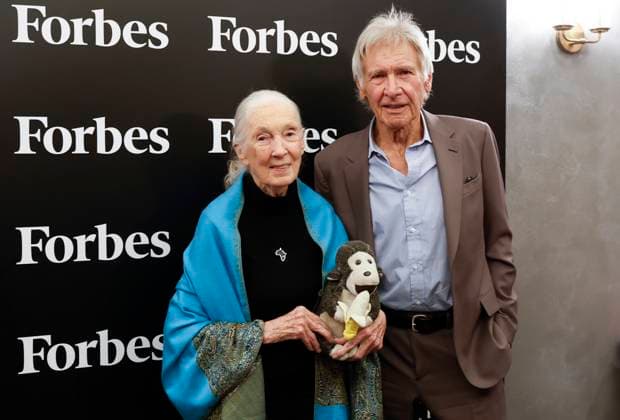 UN Messenger of Peace and Founder of The Jane Goodall Institute Dr. Jane Goodall holds Mr. H while standing with Harrison Ford at the 2025 Forbes Sustainability Leaders Summit at Forbes on Fifth on Monday, September 22, 2025 in New York City.  NYP202509212001 JohnxAngelillo