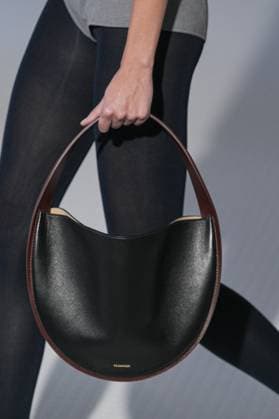 Milan, Italy: Milan, Milan Women s Fashion Week Spring Summer 2026 - Women s Fashion, Spring Summer 2026. - Jil Sander fashion show - catwalk in the photo: Bag Detail Milan Italy  - ZUMAp169 20250924_zea_p169_801 Copyright: xRiccardoxGIordanox