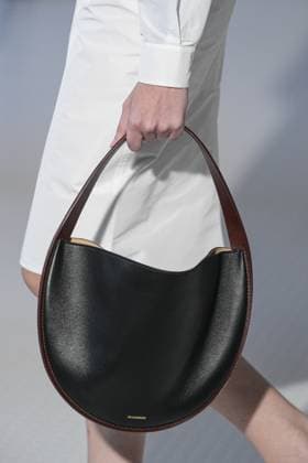 Milan, Italy: Milan, Milan Women s Fashion Week Spring Summer 2026 - Women s Fashion, Spring Summer 2026. - Jil Sander fashion show - catwalk in the photo: Bag Detail Milan Italy  - ZUMAp169 20250924_zea_p169_805 Copyright: xRiccardoxGIordanox