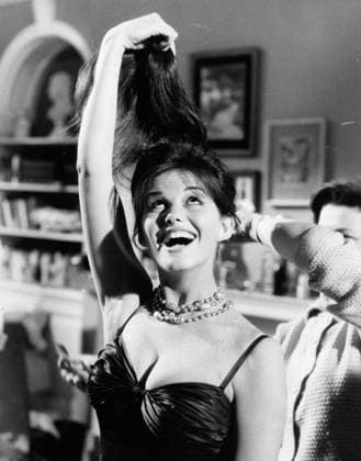 July 2, 1959: Italian actress CLAUDIA CARDINALE during filming of the 1959 comedy movie Upstairs and Downstairs . London United Kingdom  - ZUMAg49_ 19590702_glb_g49_327 Copyright: xGlobexPhotosx