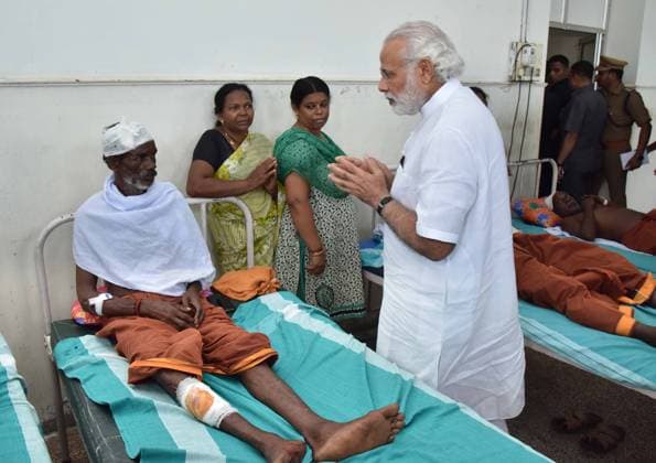 Indian Prime Minister Modi Visits Temple Disaster in Kerala April 10, 2016 - Kollam, Kerala, India - Indian Prime Minister Narendra Modi visit victims of at the Puttingal Temple explosion recovering at the Kollam District Hospital April 10, 2016 in Kollam, Kerala, India. At least 100 people were killed and 500 injured after a fireworks display exploded during a Hindu New Year festival. Copyright: xPressxInformationxBureaux