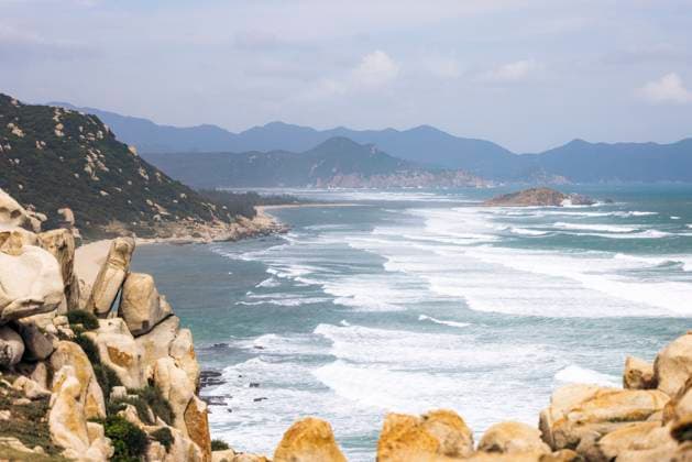 Coast line of Ninh Hai District in Ninh Thuan, Vietnam Rocky coastline with waves crashing on the shore under a cloudy sky. Ninh Hai District in Ninh Thuan, Vietnam Ninh Hai District Ninh Thuan Vietnam cane03892 Copyright: xConnectxImagesx