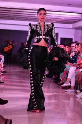 Spring Colors Fashion Week de Madrid - 26 Sep 2025 A model walks the runway wearing a design by Adan Terriquez during the Spring Colors Fashion Week de Madrid at Hotel Princesa. Madrid Spain Copyright: xAtilanoxGarciax xSOPAxImagesx FOTO49622