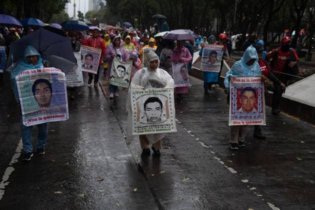 11th Anniversary of the 43 Ayotzinapa students Missing Relatives of the 43 missing students from the Ayotzinapa Teacher Training School taking part during a rally in memory of the 43 missing students from the Ayotzinapa to demand justice for the crime . on September 26, 2025 in Mexico City, Mexico. (Photo by Carlos Santiago Eyepix Group) Copyright: xMarcoxGonzalez xEyepixxGroupx MTG_26092025_170854JPEG