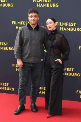 Ameer Fakher Eldin und Sibel Kekilli bei der Premiere des Kinofilms Yunan auf dem 33. Filmfest Hamburg 2025 im Cinemaxx Dammtor. Hamburg, 27.09.2025