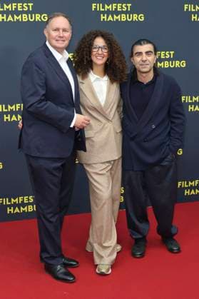 Carsten Brosda, Malika Rabahallah und Fatih Akin bei der Premiere des Kinofilms Amrum auf dem 33. Filmfest Hamburg 2025 im Cinemaxx Dammtor. Hamburg, 27.09.2025