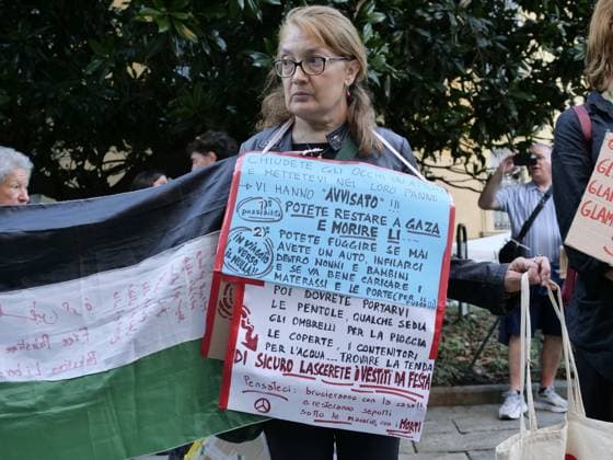 Brera District protesters gathered to protest Free Gaza before the Giorgio Armani fashion show at the entrance gate for the numerous VIP guests invited in a black van.  Copyright: xLucaxPontix xipa-agency.netx xLucaxPonti xIpaxagencyx IPA_Agency_IPA65897600