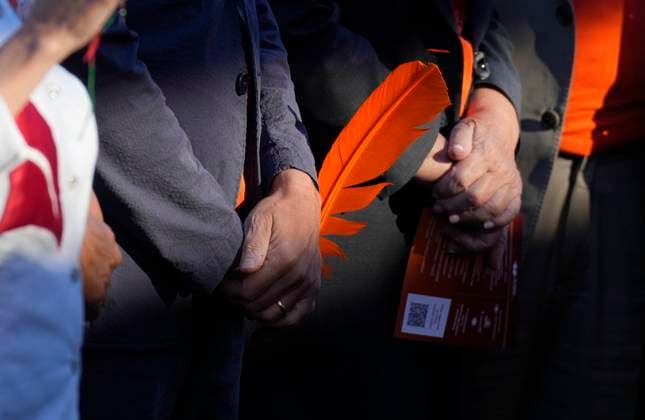 September 30, 2025, Ottawa, On, Canada: Prime Minister Mark Carney holds a feather following ceremonies for the National Day for Truth and Reconciliation on Parliament Hill in Ottawa, Tuesday, Sept. 30, 2025. Ottawa Canada  - ZUMAc35_ 20250930_zaf_c35_092 Copyright: xAdrianxWyldx