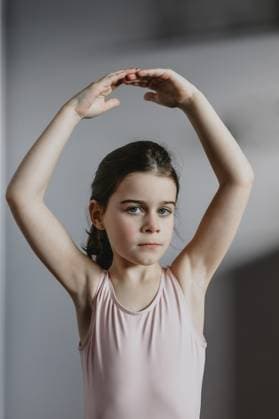 Young Ballerina in Soft Light Looking at Camera Calgary, Alberta, Canada CR_AMST250930-1776679-01 ,model released, Symbolfoto ,property released