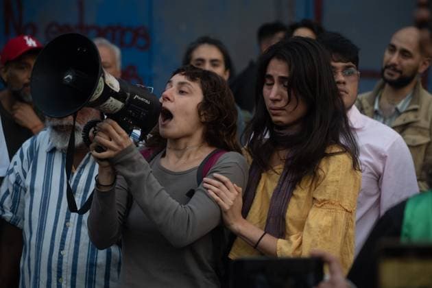 A woman taking part during a protest in front of the Ministry of Foreign Affairs (SRE) against the Israeli army s illegal detention of four Mexican activists traveling on a Sumud flotilla boat in international waters, with the purpose of delivering humanitarian aid to Gaza and demanding diplomatic break with Israel. on October 1, 2025 in Mexico City, Mexico. Mexico City Mexico - ZUMAe321 20251001_zia_e321_018 Copyright: xMarcoxGonzalezx