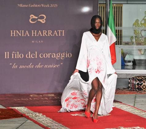 Milan, Italy Il Filo del Coraggio fashion show event dedicated to women against violence by the Italian-Moroccan designer Hnia Harrati at the Fontana e Rocce of Palazzo Lombardia during Fashion Week. Celebrities, institutions and associations are present. In the photo: model at the closing show with a particular white dress symbolizing the fight against violence against women.  Copyright: xNickxZonnax xipa-agency.netx xNickxZonnax IPA_Agency_IPA66058140