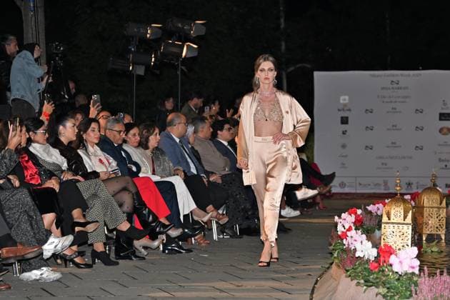 Milan, Italy Il Filo del Coraggio fashion show event dedicated to women against violence by the Italian-Moroccan designer Hnia Harrati at the Fontana e Rocce of Palazzo Lombardia during Fashion Week with the presence of personalities, institutions and associations. In the photo: fashion show with public and institutions present.  Copyright: xNickxZonnax xipa-agency.netx xNickxZonnax IPA_Agency_IPA66058204