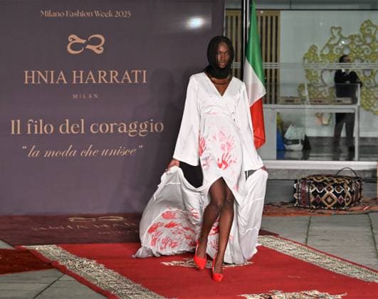 Milan, Italy Il Filo del Coraggio fashion show event dedicated to women against violence by the Italian-Moroccan designer Hnia Harrati at the Fontana e Rocce of Palazzo Lombardia during Fashion Week. Celebrities, institutions and associations are present. In the photo: model at the closing show with a particular white dress symbolizing the fight against violence against women.  Copyright: xNickxZonnax xipa-agency.netx xNickxZonnax IPA_Agency_IPA66058213