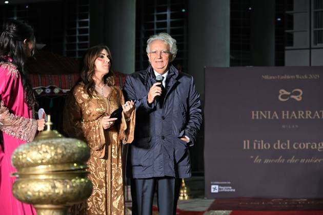 Milan, Italy Il Filo del Coraggio fashion show event dedicated to women against violence by the Italian-Moroccan designer Hnia Harrati at the Fontana e Rocce of Palazzo Lombardia during Fashion Week. Celebrities, institutions and associations are present. In the photo: Hnia Harrati delivers a plaque of recognition to Magistrate Fabio Roja, President of the Court of Milan.  Copyright: xNickxZonnax xipa-agency.netx xNickxZonnax IPA_Agency_IPA66058247