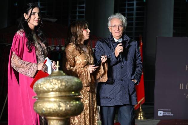 Milan, Italy Il Filo del Coraggio fashion show event dedicated to women against violence by the Italian-Moroccan designer Hnia Harrati at the Fontana e Rocce of Palazzo Lombardia during Fashion Week. Celebrities, institutions and associations are present. In the photo: Hnia Harrati delivers a plaque of recognition to Magistrate Fabio Roja, President of the Court of Milan.  Copyright: xNickxZonnax xipa-agency.netx xNickxZonnax IPA_Agency_IPA66058256