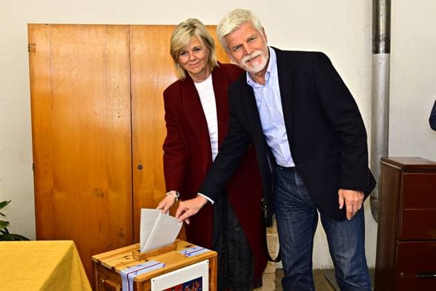 Czech President Petr Pavel and his wife Eva Pavlova cast their vote on the first day of the 2025 Czech parliamentary election in the polling station in Cernoucek, Usti nad Labem Region, Czech Republic, October 3rd, 2025. (CTKxPhoto OndrejxHajek) CTKPhotoP2025100304620  CTKPhotoP2025100304620