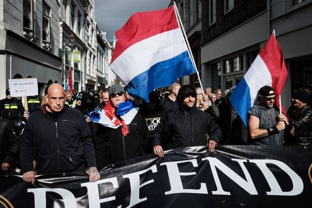 SCHIEDAM - Demonstrators during a protest against the arrival of asylum seekers centers. ANP RAMON VAN FLYMEN netherlands out - belgium out  Copyright: xx x538299859x originalFilename: 538299859.jpg