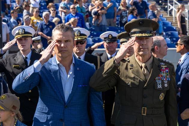 October 4, 2025, Annapolis, Maryland, USA: Secretary of War PETE HEGSETH and United States Naval Academy Superintendent Marine Corps Lieutenant General MICHAEL J. BORGSCHULTE salute during the national anthem at the Navy vs. Air Force football game. Annapolis USA - ZUMAs365 20251004_znp_s365_003 Copyright: xJoeyxSussmanx