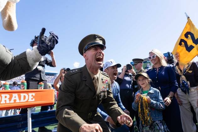 October 4, 2025, Annapolis, Maryland, USA: United States Naval Academy Superintendent Marine Corps Lieutenant General MICHAEL J. BORGSCHULTE yells into a crowd with Secretary of War PETE HEGSETH following suit right behind him at the Navy vs. Air Force football game. Annapolis USA - ZUMAs365 20251004_znp_s365_009 Copyright: xJoeyxSussmanx