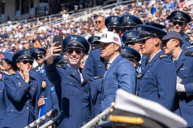 October 4, 2025, Annapolis, Maryland, USA: Secretary of War PETE HEGSETH takes a selfie with an Air Force Academy cadet at the Navy vs. Air Force football game. Annapolis USA - ZUMAs365 20251004_znp_s365_026 Copyright: xJoeyxSussmanx