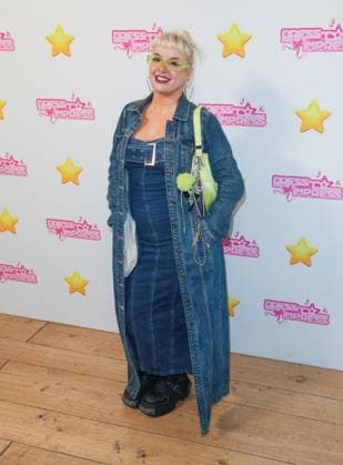 October 4, 2025, London, United Kingdom: Nikita Holly seen arriving for the Dress To Impress Fashion Show at Somerset House in London. London United Kingdom - ZUMAs197 20251004_aaa_s197_482 Copyright: xBrettxCovex
