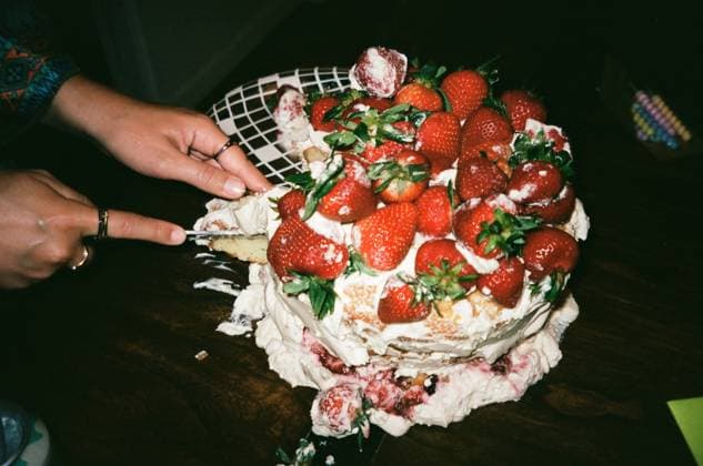 A homemade strawberry shortcake being cut, San Diego, California, United States CR_QCYJ251004-1809554-01