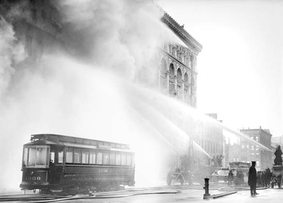 fire fighters, emergency workers, occupations, New York City, historical, May 2, 2022, New York City, New York, USA: Fireman spraying water on burning building, 14th Street, New York City, New York, USA, Bain News Service, December 1909 Copyright: xJTxVintagex