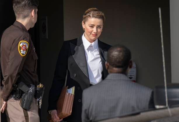 Johnny Depp and Amber Heard Defamation Trial May 3, 2022, Fairfax, Virginia, USA: Amber Heard departs from the Fairfax County Courthouse in Fairfax, Virginia, following day 14 of her defamation lawsuit against his former husband, actor Johnny Depp, after she wrote an op-ed in The Washington Post in 2018 that, without naming Depp, accused him of domestic abuse on Tuesday, May 3, 2022 Copyright: xRonxSachsx