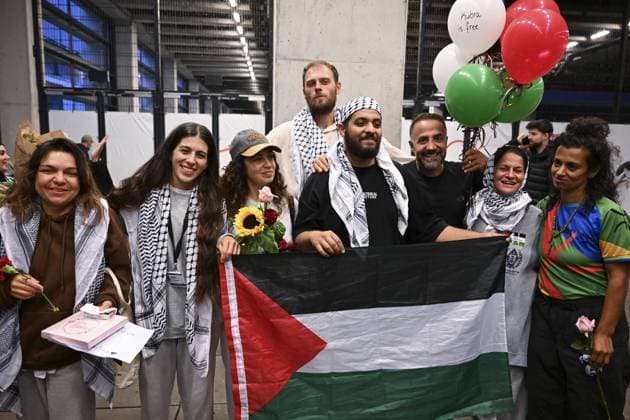 Eight German activists arrive in Germany after detained by Israel BERLIN, GERMANY - OCTOBER 7: Eight German activists from the Global Sumud Flotilla Leslie (L), Kubra Emine Cinar (2nd L), Maryam (3rd L), Tim (4th L), Khaled (4th R), Hassan (3rd R), Yasemin Acar (2nd R), and Luna (R), who were detained by Israel after its military intercepted the aid mission, arrive in Berlin and reunite with their families in Germany on October 7, 2025. Halil Sagirkaya Anadolu Berlin Germany. Editorial use only. Please get in touch for any other usage.  Copyright: x2025xAnadoluxHalilxSagirkayax