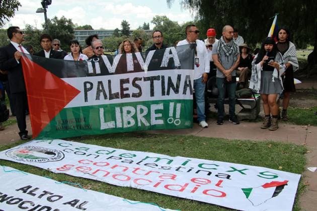 Free Palestine University Conference At The National Autonomous University Of Mexico (UNAM) In Mexico City Students from various faculties of the National Autonomous University of Mexico (UNAM), as well as academics and university unions, participate in a political event as part of the Free Palestine University Day at Ciudad Universitaria in Mexico City, Mexico, on October 7, 2025. On this day, two years after the start of the genocide in Gaza, attendees reaffirm their solidarity with the Palestinian people and the demand to break relations with the State of Israel. MÃ xico City Mexico  Copyright: xJosexLuisxToralesx originalFilename: torales-notitle251007_npQD1.jpg