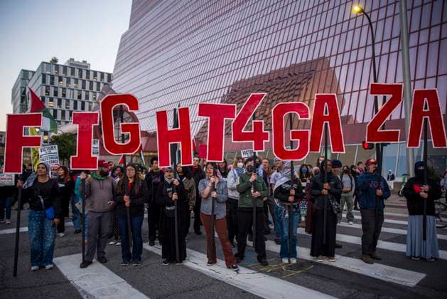 October 7, 2025, Minneapolis, Minnesota, United States: Protestors carry giant letters that spell out Ã¢â‚¬oeFight 4 Gaza.Ã¢â‚¬Â On October 7, 2025, pro-Palestinian protestors gathered at the Diana E. Murphy Federal Courthouse in Minneapolis, Minnesota. They gathered on the two-year anniversary of the start of the genocide in Gaza, and to march for Palestinian liberation. Minneapolis United States - ZUMAp202 20251007_zip_p202_011 Copyright: xJamesxPetermeierx