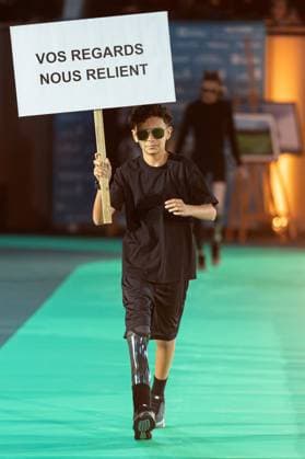 Runway For The Association Debout En Bouts At Roland-Garros Kais Chafia walks the runway for the association Debout En Bouts. 30 amputees wearing prosthetics parade on the Philippe-Chatrier court at Roland-Garros stadium on October 08, 2025 in Paris, France. Photo by Nasser Berzane ABACAPRESS.COM Paris France  Copyright: xBerzanexNasser ABACAx