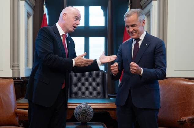 October 10, 2025, Ottawa, On, Canada: Prime Minister Mark Carney, right, jokes around with FIFA President Gianni Infantino in his office on Parliament Hill in Ottawa, Friday, Oct. 10, 2025. Ottawa Canada  - ZUMAc35_ 20251010_zaf_c35_076 Copyright: xAdrianxWyldx