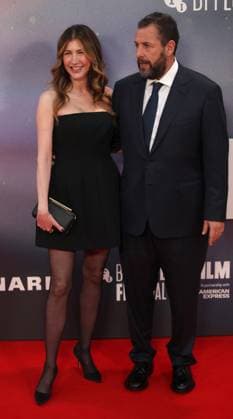 Jay Kelly premiere London, UK. Adam Sandler and Jackie Sandler at the Jay Kelly premiere. 69th BFI London Film Festival. Royal Festival Hall. 10th October 2025. LMK11-S101025-002 Steve Bealing Landmark Media 
