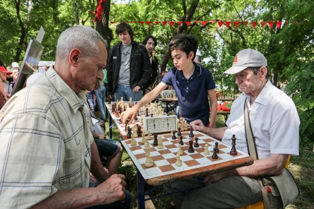 Children s holiday in Odessa, Ukraine - 31 May 2022 May 31, 2022, Odessa, Ukraine: Children and the elderly people seen playing chess at the children s party in Odessa People s Church. In connection with the military actions of the Russian Federation, there are many internally displaced people in Odessa. Children s holiday was organized for them and their children. Copyright: xViacheslavxOnyshchenkox