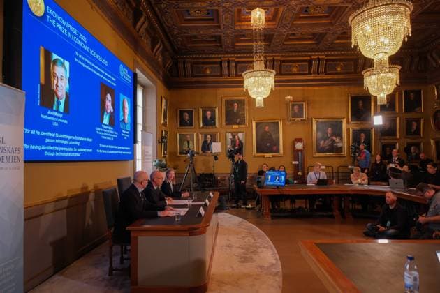 October 13, 2025, Stockholm, Sweden: Officials of the Royal Swedish Academy of Sciences announce the winners of the Nobel Prize for Economics for 2025 at a news conference at Stockholm University. The official name for the prize is The Swedish Riksbank Prize in Economic Sciences in Memory of Alfred Nobel 2025. The Nobel Laureates are JOEL MOKYR, of Northwestern University in Evanston, Illinois, PHILIPPE AGHION, of the College de France and INSEAD, Paris, France and the London School of Economics, and PETER HOWITT, of Brown University in Providence, Rhode Island. Announcing the awards were, left to right at the dais Professor JOHN HASSLER, Chair of the Committee for the Prize in Economic Sciences in Memory of Alfred Nobel,HANS ELLEGREN, - ZUMAs51_ 20251013_fap_s51_015 Copyright: xRobxSchoenbaumx