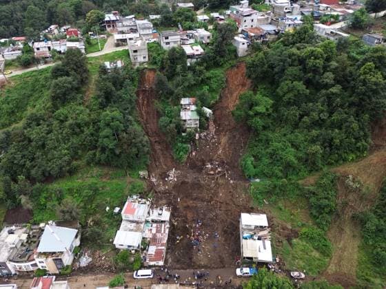 251014 -- BEIJING, Oct. 14, 2025 -- This drone photo taken on Oct. 13, 2025 shows a landslide caused by the heavy rain in Huauchinango, Puebla state, Mexico. At least 64 people have died and dozens remain missing after days of torrential rains and flooding that hit central and eastern Mexico last week, authorities said Monday. Photo by Xinhua XINHUA PHOTOS OF THE DAY FranciscoxCanedo  XINHUA PHOTOS OF THE DAY IMAGO FranciscoxCanedo  imago images 1067750943