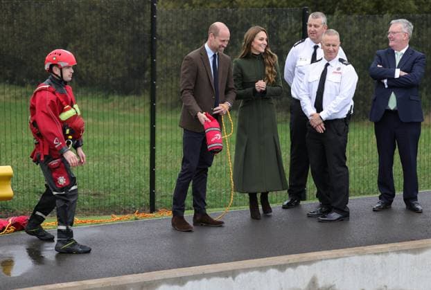 The Prince and Princess of Wales Visit Northern Ireland 14 10 2025. Cookstown, UK. The Prince and Princess of Wales during a visit to the Northern Ireland Fire and Rescue Service Learning and Development College in Cookstown, Northern Ireland. The Prince and Princess met with Chief Fire & Rescue Officer, Aidan Jennings and learned how the college equips trainees with the skills, resilience and expertise needed to help keep everyone in Northern Ireland safe. Their Royal Highnesses then engaged with two training scenarios: a warehouse space where there was a variety of simulated incidents and drills ongoing, and the flood-water rescue training space to see a simulation of a casualty being rescued from a fast-flowing river. During these scenar  Copyright: xPetexMaclainex xAvalonx 1045438330