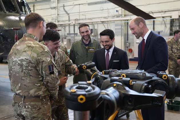 Royal visit to RAF Benson The Prince of Wales (right) and the Crown Prince Hussein of Jordan look at a main rotor head from a chinook helicopter as they meet trainee aircrew and staff from No. 28 (AC) Sqn and No. 22 Sqn during a visit to RAF Benson in Wallingford, Oxfordshire. Picture date: Wednesday October 15, 2025., Credit:Andrew Matthews Avalon UK, Wallingford  Copyright: xAndrewxMatthewsx xAvalonx 1045749029
