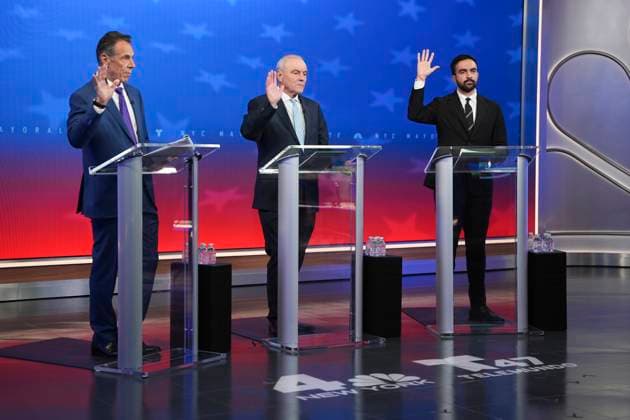 From left, Independent candidate former New York Gov. Andrew Cuomo, Republican candidate Curtis Sliwa and Democratic candidate Zohran Mamdani participate in a mayoral debate on Thursday, October 16, 2025 in New York City. Pool  NYP202510162757 AngelinaxKatsanis