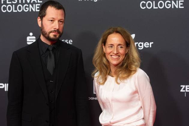 Red Carpet Before The Award Ceremony For Cologne Film Festival 2025 Mstyslav Chernov, a Ukrainian filmmaker and the Phoenix Press Award winner, and Eva Lindnau, a Phoenix Program Director, pose for pictures during the red carpet before the award ceremony of the Cologne Film Festival 2025 at Film Palast in Cologne, Germany, on October 26, 2025. cologne Germany  Copyright: xYingxTangx originalFilename: tang-notitle251016_np7db.jpg