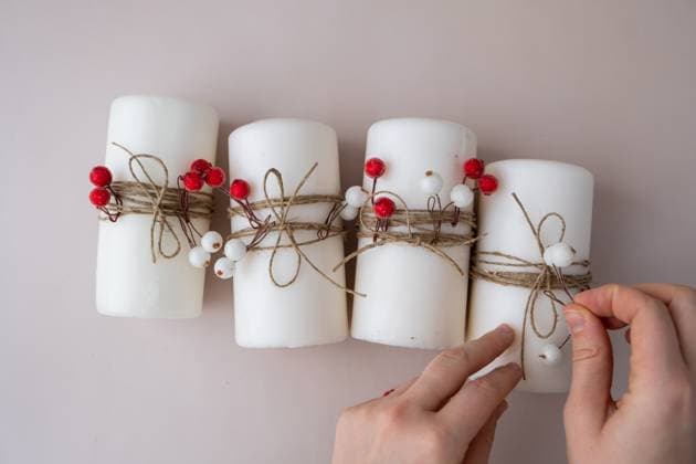 Step by step instruction of making handmade Christmas advent four weeks candle calendar. Female hands creating craft homemade decor. New year celebration. Winter holidays Step by step instruction of making handmade Christmas advent four weeks candle calendar. Female hands creating craft homemade decor. New year celebration. Winter holidays. Do it yourself, 60571518.jpg RECORD DATE NOT STATED