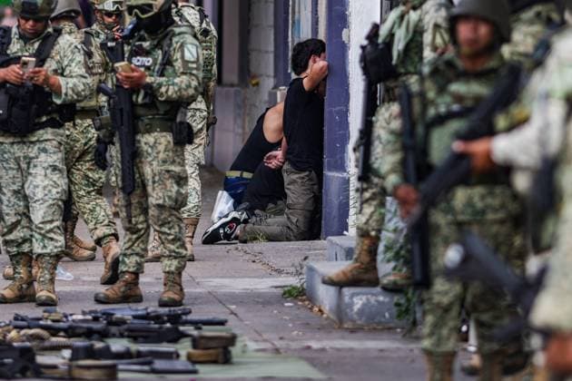 Two police officers were killed while on duty in Mexico CULIACAN, MEXICO - OCTOBER 17: Four young men were arrested for their alleged involvement in the murder of two Culiacan Municipal Traffic Police officers on October 17, 2025 in Culiacan, Mexico. The suspected gunmen were traveling in a white Toyota Corolla when they were intercepted by members of the Mexican Army. Authorities also seized long guns, tactical gear, and ammunition of various calibers. The arrest took place just minutes after the crime in which the municipal officers from Culiacan, were killed. Jesus Verdugo Anadolu Culiacan Mexico. Editorial use only. Please get in touch for any other usage.  Copyright: x2025xAnadoluxJesusxVerdugox
