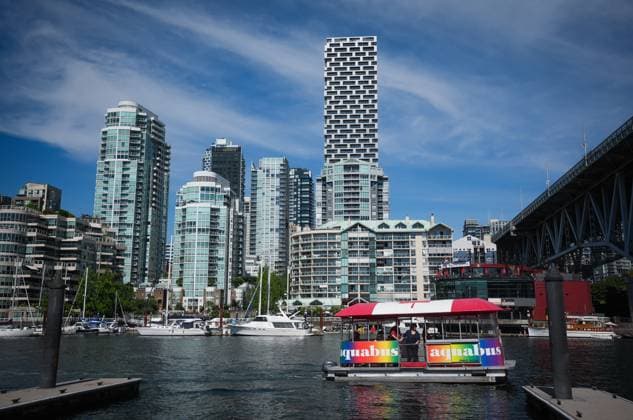August 1, 2025, Vancouver, Bc, CANADA: An Aquabus water taxi carrying tourists prepares to dock at Granville Island in Vancouver, B.C., Friday, Aug. 1, 2025. Vancouver CANADA  - ZUMAc35_ 20250801_zaf_c35_303 Copyright: xDarrylxDyckx