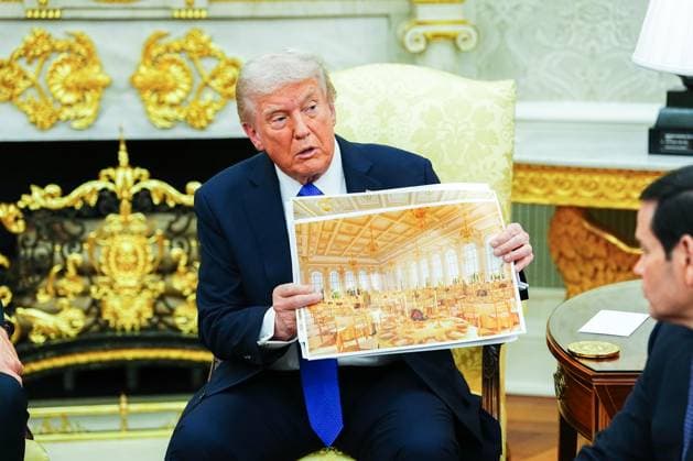 President Donald Trump shows an interior rendering of the new White House Ballroom while meeting with Secretary General of NATO Mark Rutte in the Oval Office of the White House in Washington, DC on Wednesday, October 22, 2025. The leaders are meeting to discuss continuing support for Ukraine.  WASP20251022315 AaronxSchwartz