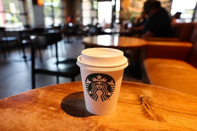 Austin Economy And Daily Life Starbucks Coffee cup is seen on a cafe table in this illustration photo taken in Austin, United States on October 22, 2025. Austin United States  Copyright: xJakubxPorzyckix originalFilename: porzycki-austinec251022_npSWZ.jpg